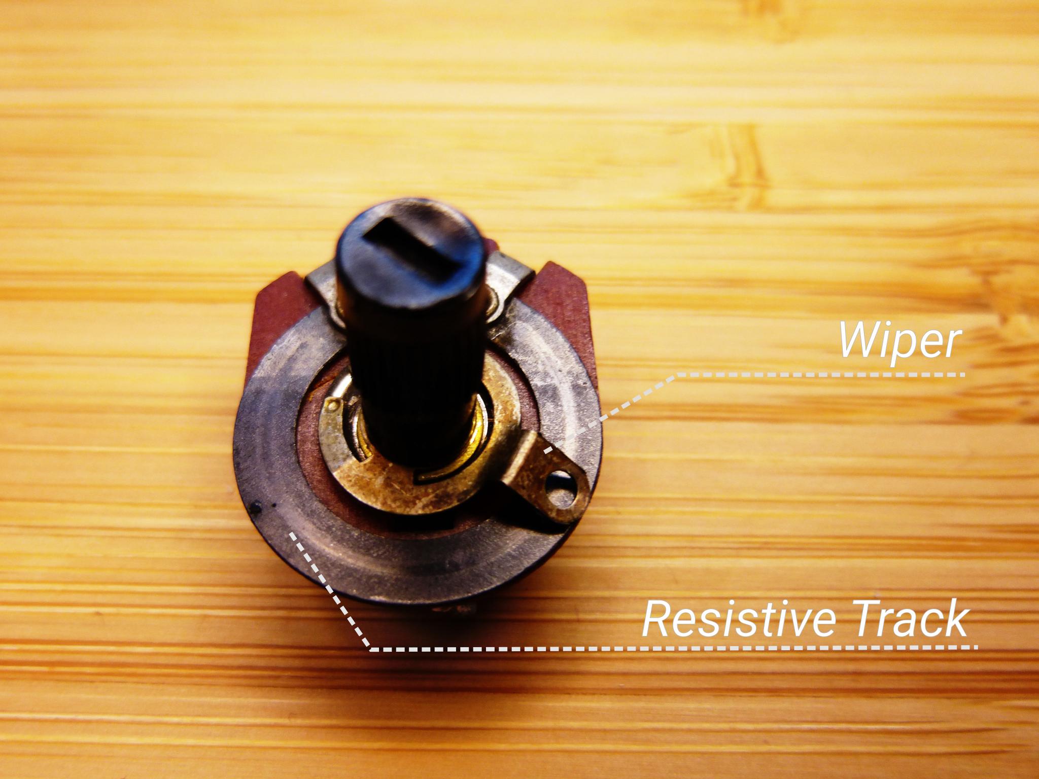 Potentiometer with exposed wiper